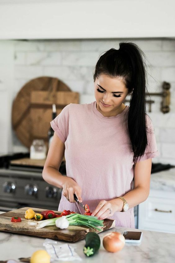 woman preparing vegetables